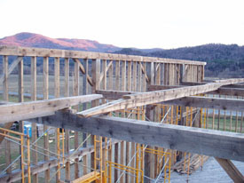View of purlin plate before assembly. All scarf joints had one centered bolt and four wedged pegs.  This photo was also found on the VYCC site.