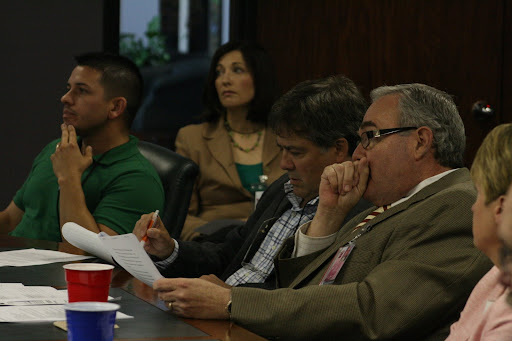 Councilman Chiles consults Mayor O'Neal for clarification on a specific point. (photo credit: James Mulvenon)