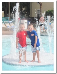 Florida vacation at condo Kyle and Cody in the pool