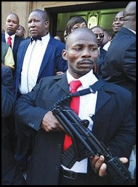 MALEMA brought his body guards with their AK47s inside the Equality Court at his hatespeech trial DID NOT GET ARRESTED
