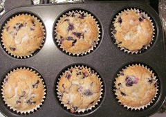 blueberry cake in muffin tin baked
