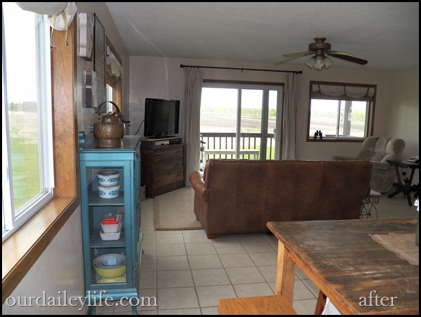 k aft 03 cream walls, dropcloth shades, vintage teal cabinet, minnesota subway art, neutral rug, vintage pyrex