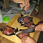 Cook em up! - Heres Ben getting his catch all salted and peppered and sliced right for the deep fryer....Ang sarap, pare! Cook em up! - Heres Ben getting his catch all salted and peppered and sliced right for the deep fryer....Ang sarap, pare!
