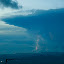 This storm cloud was gathering strength to the right, it came nowhere close but I was pleased to get this shot of lightning, however small!