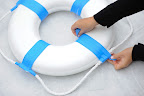 Step 1: Cover the straps that secure the ropes to the preserver with painter's tape to protect them from paint.