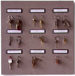For keeping track of her many keys, Martha uses a labeled Homasote board. Each key has it's own label and corresponding hook. This system makes it easy to just grab and go. For keeping track of her many keys, Martha uses a labeled Homasote board. Each key has it's own label and corresponding hook. This system makes it easy to just grab and go.