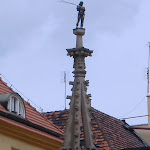 This is the flogging post outside the town hall. Petty thieves were tied to it, and beaten - hence the little guy on top.