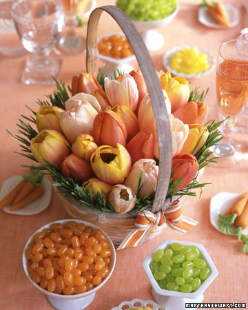 A simple way to create a memorable centerpiece for your Easter table is to arrange flowers in a basket instead of a vase and I love that the tulips look like easter eggs. (marthastewart.com)