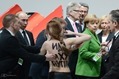 FEMEN-Topless-Protest-Putin-Merkel-VW-2