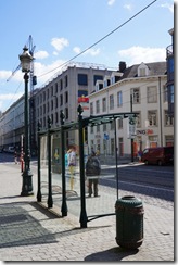 Art Nouveau lamp, tram station and bin