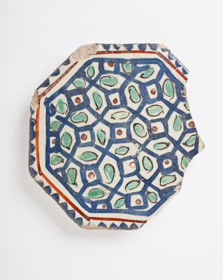 Tile | Origin: Iran | Period: late 12th-early 13th century | Collection: The Madina Collection of Islamic Art, gift of Camilla Chandler Frost (M.2002.1.177) | Type: Ceramic; Architectural element, Fritware, stain- and overglaze-painted, Point to point: 3 15/16 in. (10 cm)