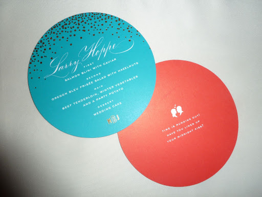 The menu cards served as place cards, with names calligraphed by John Decollibus. The backs read: Time is running out! Have you lined up your midnight kiss?