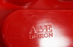 Red plastic desk organizer by Tom Ahlström and Hans Ehrich for Argö