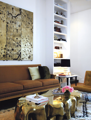 Milk-chocolate sofa against a white backdrop. (cocokelley.blogspot.com)