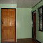 The first house I was in with Adrian, Griselda, and Roy. My room on the left. Entrance to the house on the right.