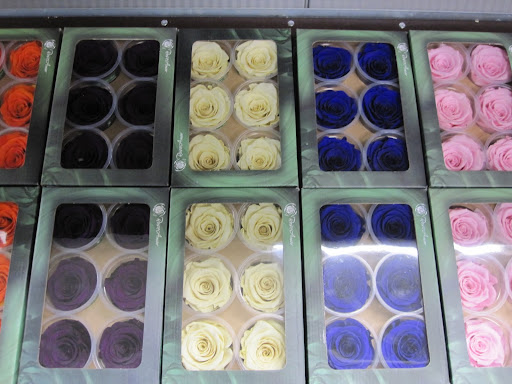 You can wire freeze-dried roses into your arrangements and they last a few weeks!