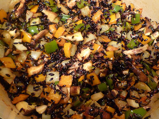 Add the rice, paprika, and salt.