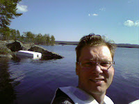 Jag kör båt och tar kort med mobilen...
