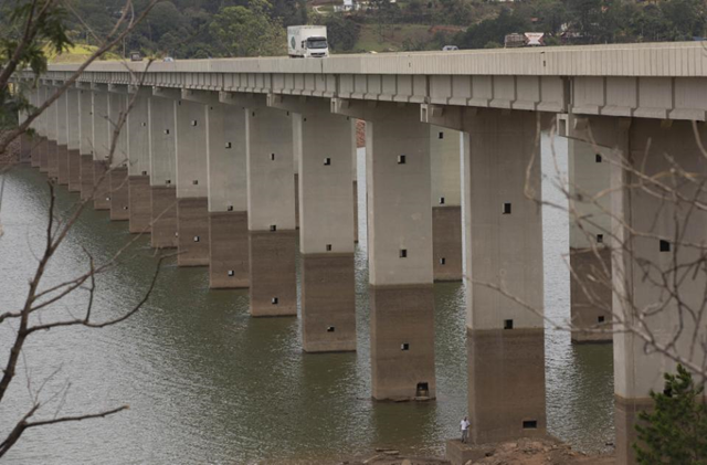 In this 29 January 2015 file photo, a bridge's columns are marked by the previous water line over the Atibainha reservoir, part of the Cantareira System that provides water to the Sao Paulo metropolitan area, in Nazare Paulista, Brazil. In 2015, Brazil's biggest city recorded its rainiest March since 2008, but the worst drought in more than 80 years has left reservoir levels critically low, and water experts fear that strict water rationing may still loom for Sao Paulo as it enters the April-September dry season. Photo: Andre Penner / AP Photo