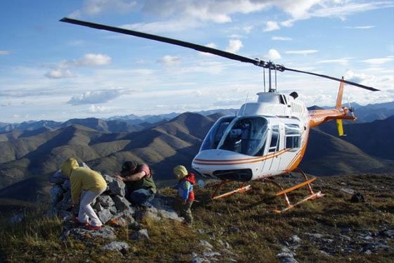 Hikers_exiting_helicopter_on_hiking_trip_655292.jpg