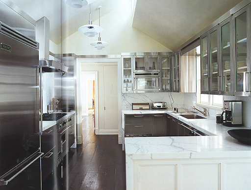 This modern kitchen is at the heart of a home built in the 1800s. Just look at those wide-plank floors—stunning! This modern kitchen is at the heart of a home built in the 1800s. Just look at those wide-plank floors—stunning!