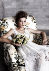 I love the boho feel of this empire-waist wedding gown from Collette Dinnigan (www.collettedinnigan.com.au).