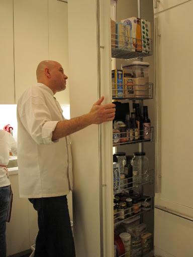 Chef Pierre goes in to my pull-out-pantry to find a few items he needs to cook dinner.
