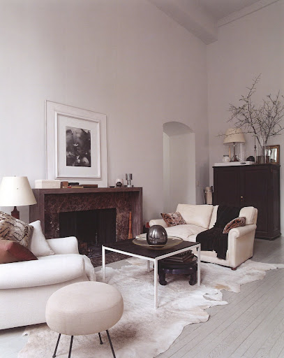 That gorgeous extended fireplace is made out of one extended slab of marble. That gorgeous extended fireplace is made out of one extended slab of marble.