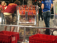 A student making last minute repairs in the finals