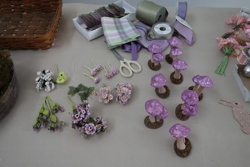 A few yards of vintage lavender ribbon just needed a quick starching, and those mushroom caps went from red to amethyst with a careful coat of glitter from Martha Stewart Crafts.