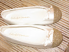 Look how cute these ballet flats are. We simply tape off the tip of the slipper, applied Martha Stewart Craft glitter glue and glittered!