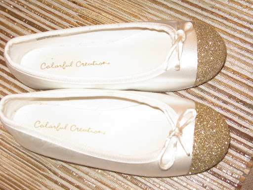 Look how cute these ballet flats are. We simply tape off the tip of the slipper, applied Martha Stewart Craft glitter glue and glittered!