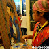 Ronald Tamfalan of the T'boli tribe paints on dagmay fabric, as part of the Kadayawan Fiesta at the Apo View Hotel
