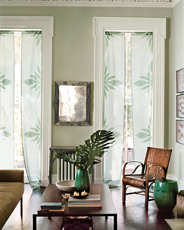 A border of pale-green appliqués dresses up sheer linen curtains without blocking the sunshine.
