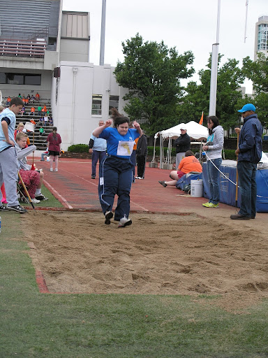 Special Olympics athlete participating in the long jump.
(Photo credit: Jeremy Shreckhise)