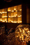 Danielle cleverly inverted a vessel and filled it with carnival lights to decorate the bar. It was inspired by the ball that drops in Times Square every year in New York City.