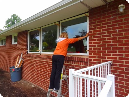 Masha helping with windows.