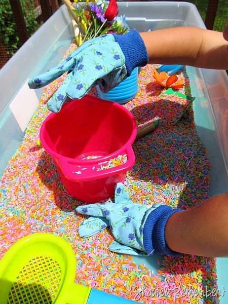 Child sized gardening gloves and buckets for Rainbow Rice & Garden Sensory Play bin