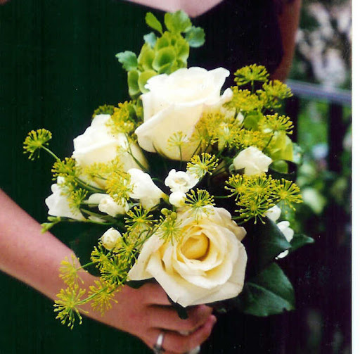 Roses, freesia, bells of Ireland, and flowering dill have a rustic and wildflower feel.
Photo by Heather Barrie. Roses, freesia, bells of Ireland, and flowering dill have a rustic and wildflower feel.
Photo by Heather Barrie.