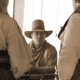 Every year, for one weekend, OldSacramento time warps back to the Old West. All of the streets morph from pavement to dirt and people are walking around dressed real funny with big poofy dresses and lacy umbrellas...go figure. ;-) It's really a lot of fun. The Blue Canyon Gang puts on gun fights throughout the weekend. Blue Canyon Gang SEPIA