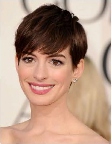 Makeup artist Kate Lee prepped Anne Hathaway's skin with Chanel Hydra Beauty Serum and Base Lumiere Illuminating Makeup Base. A pale peach blush topped the apples of her cheeks, beautifully contrasting her petal pink lips in Chanel Rouge Allure Luminous Lip Colour in Sedusicante. Photo courtesy of Chanel.