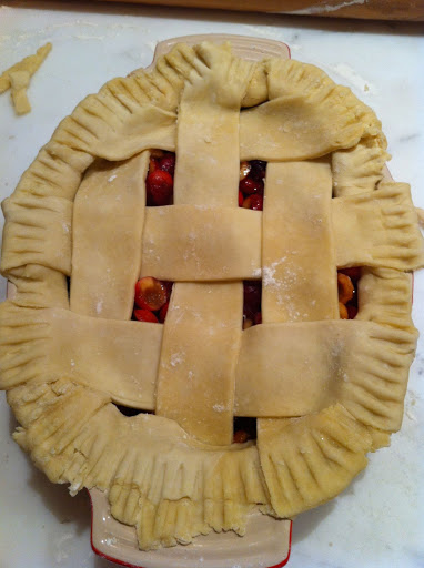 I added the lattice strips, tucked under, pressed, and crimped with a fork.
