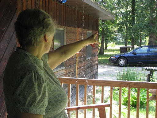 Janice Buchanan points to the path which leads to Purdy's home. (Photo credit: Jennifer Moore)