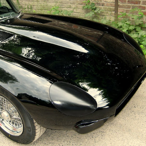 Prototype Jaguar XK-E, with Head-Light-Cover-Kit. The Head-Lamp-Cover Conversion-Kit made by designer Stefan Wahl in the tradition of Malcolm Sayer. / Jaguar e-Type mit Scheinwerferabdeckungen, designed und hergestellt von Designer Stefan Wahl in der Tradition von Malcolm Sayer.