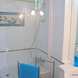 Geranium bathroom has jacuzzi