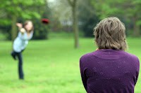 Shelley throwing to Stacey