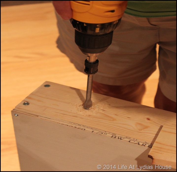 drilling a hole for the legs