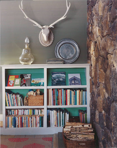 I find inspiration in the robin's egg blue backdrop and the whimsical accessories surrounding this children's bookcase. The angled top-shelf is also a subtle but brilliant idea for displaying picture books on shorter units. I find inspiration in the robin's egg blue backdrop and the whimsical accessories surrounding this children's bookcase. The angled top-shelf is also a subtle but brilliant idea for displaying picture books on shorter units.