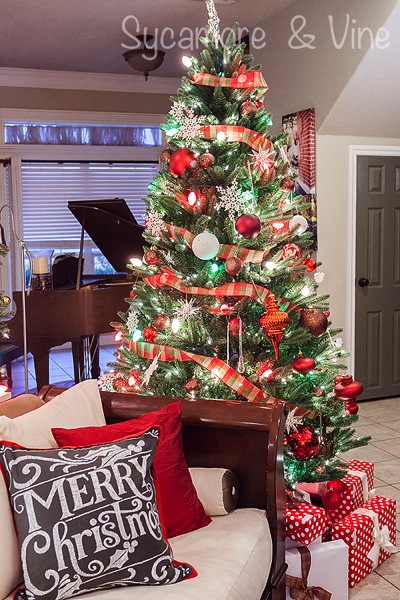 Chalkboard inspired Merry Christmas pillow. A truly stunning Christmas Home Tour as part of the Christmas in the Country Blog Tour. This Plaid Inspired Country Christmas will knock your socks off. Features tours of the Living room, Dining Room and a Cocoa hot chocolate bar in the Breakfast room. There is so much inspiration for Christmas decorations in this one post. Be prepared to feel like you are cuddled up by the fire in a warm Northwoods comfy cottage! #country #Christmas #Plaid #Holiday decorating #Holiday ideas #Holidays #Christmas decor #Holiday decor Chalkboard inspired Merry Christmas pillow. A truly stunning Christmas Home Tour as part of the Christmas in the Country Blog Tour. This Plaid Inspired Country Christmas will knock your socks off. Features tours of the Living room, Dining Room and a Cocoa hot chocolate bar in the Breakfast room. There is so much inspiration for Christmas decorations in this one post. Be prepared to feel like you are cuddled up by the fire in a warm Northwoods comfy cottage! #country #Christmas #Plaid #Holiday decorating #Holiday ideas #Holidays #Christmas decor #Holiday decor
