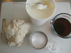 Ingredients needed to make the finished dough. Corn masa, lard or shortening, stock/broth or water, baking powder and salt.